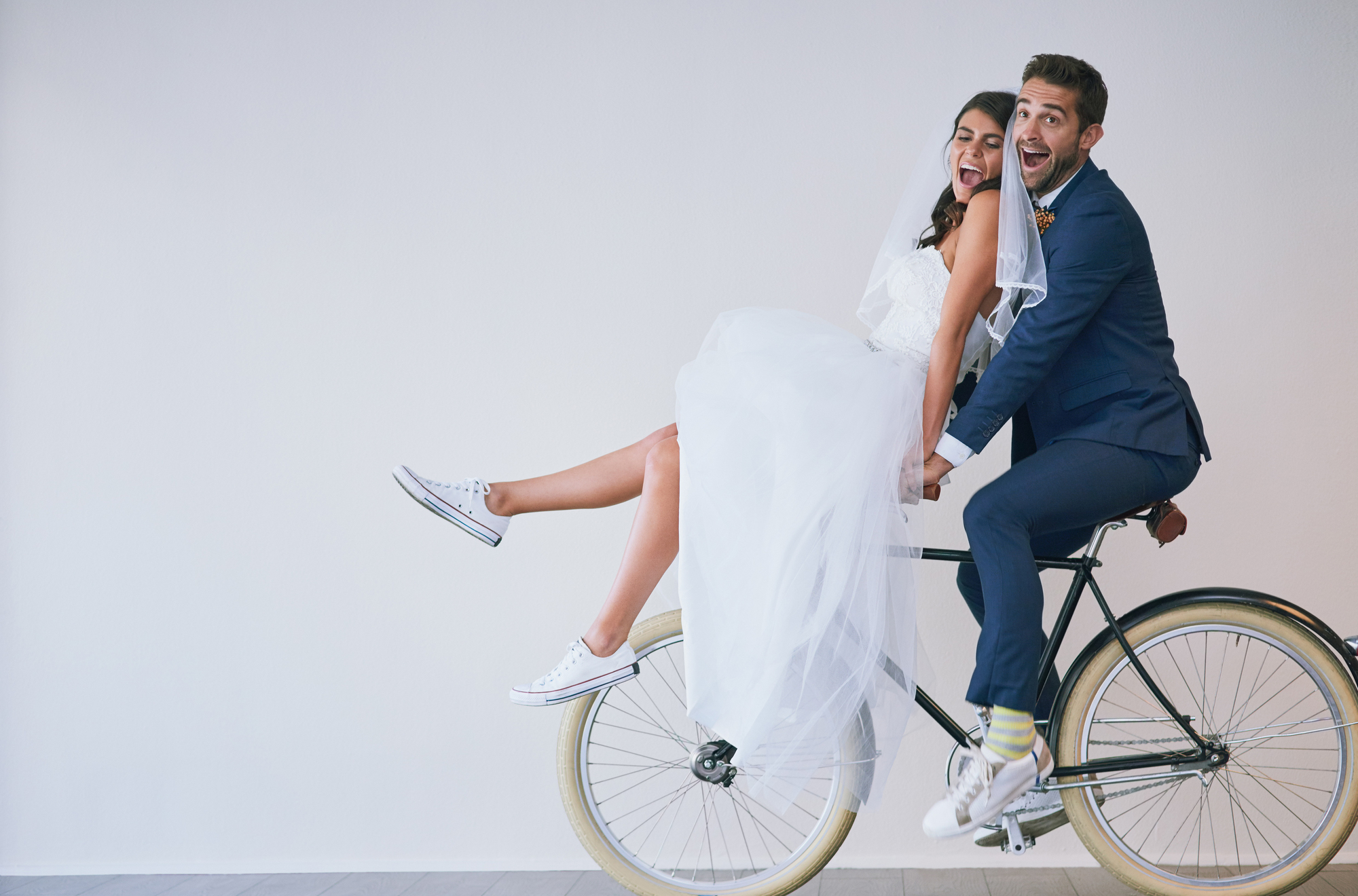 Bride and Groom on a bike